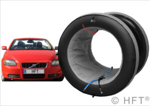 Car with large inflatable pipe stop.